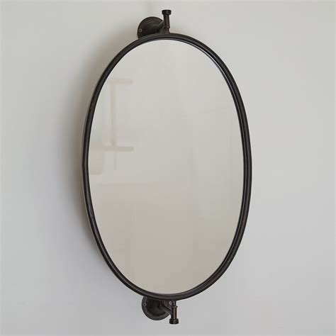 true antique metal swivel oval mirror with fist bracket|antique swivel mirrors.